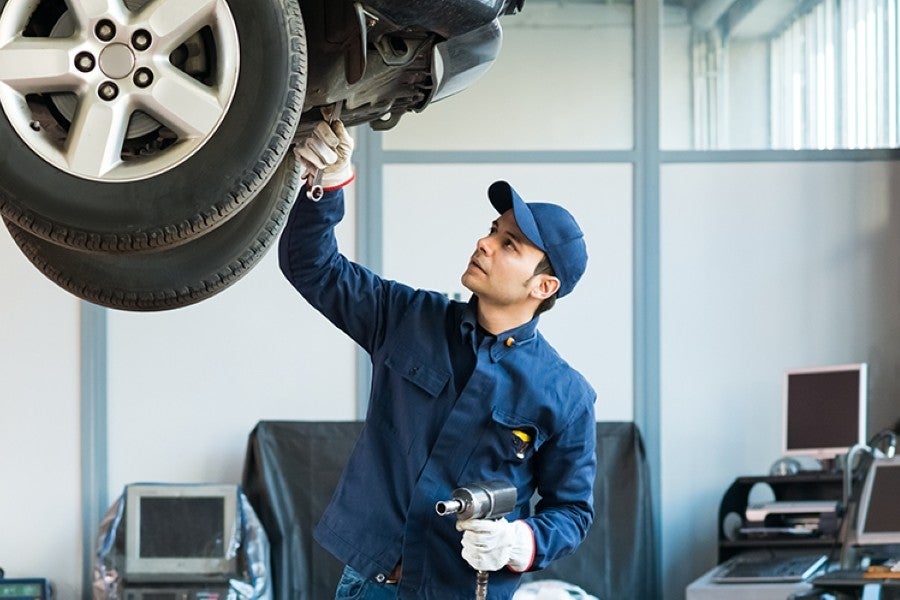 Man changing a car tire